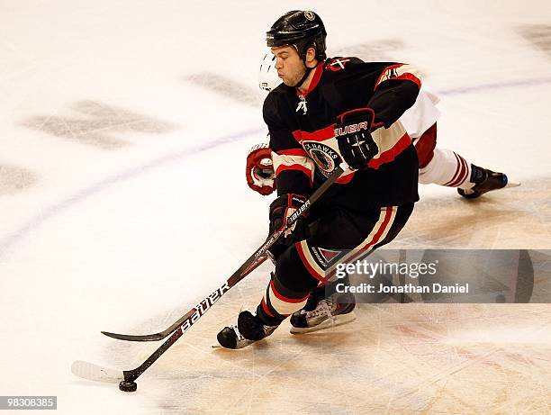 Brent Seabrook of the Chicago Blackhawks controls the puck against the Phoenix Coyotes at the United Center on March 23, 2010 in Chicago, Illinois....