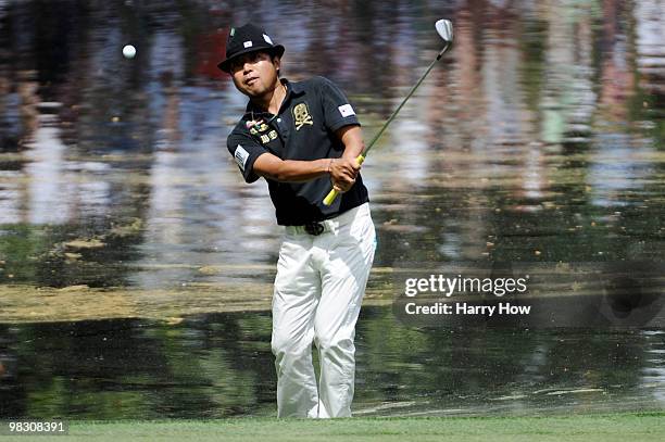 Shingo Katayama of Japan hits a shot during the Par 3 Contest prior to the 2010 Masters Tournament at Augusta National Golf Club on April 7, 2010 in...