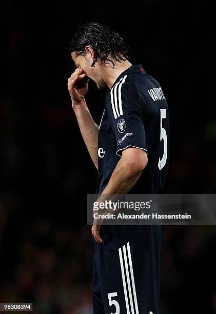 Daniel Van Buyten of Bayern Muenchen looks dejected during the UEFA Champions League Quarter Final second leg match between Manchester United and...