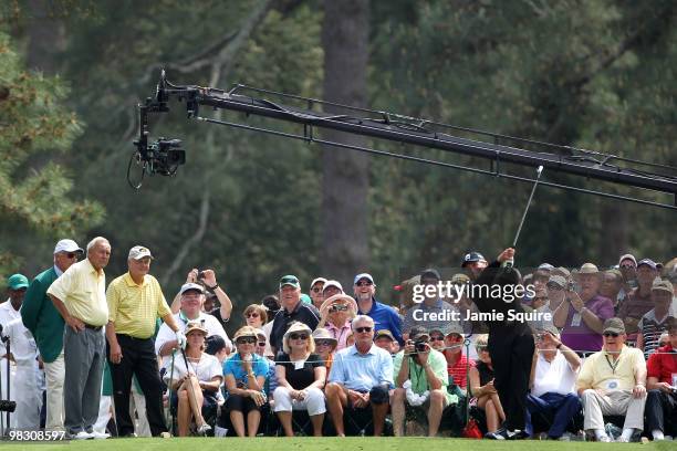 Gary Player of South Africa watches a shot as Arnold Palmer and Jack Nicklaus look on during the Par 3 Contest prior to the 2010 Masters Tournament...