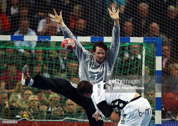 Dan Beutler, goalkeeper of Flensburg-Handewitt saves the ball during the Toyota Handball Bundesliga match between THW Kiel and SG Flensburg-Handewitt...