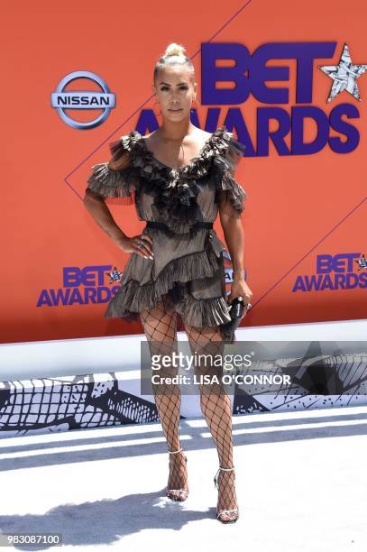 Sibley Scoles poses upon arrival for the BET Awards at Microsoft Theatre in Los Angeles, California, on June 24, 2018.