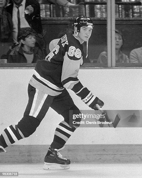 Mario Lemieux of the Pittsburgh Penguins skates against the Montreal Canadiens in the 1980's at the Montreal Forum in Montreal, Quebec, Canada.