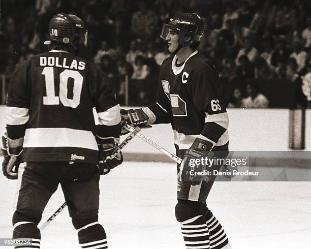 Mario Lemieux and Bobby Dollas of the Laval Voisins of the QMJHL skates in the early 1980's at the Montreal Forum in Montreal, Quebec, Canada.