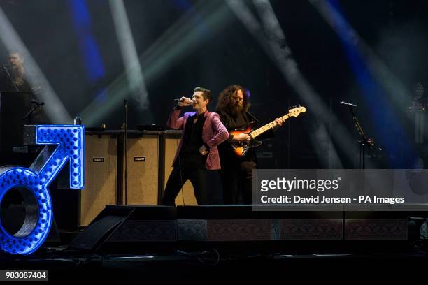 The Killers perform on stage during the Isle of Wight festival at Seaclose Park, Newport.