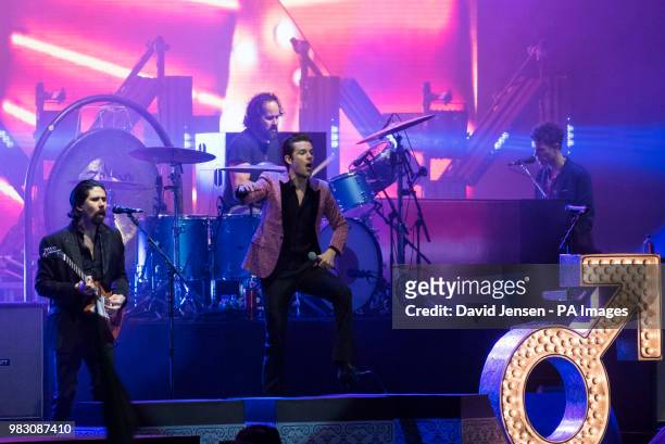 The Killers perform on stage during the Isle of Wight festival at Seaclose Park, Newport.