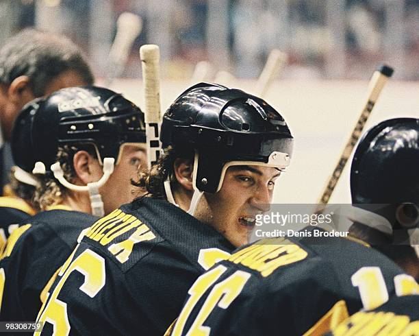 Mario Lemieux of the Pittsburgh Penguins sits on the bench during the game against the Montreal Canadiens in the 1980's at the Montreal Forum in...