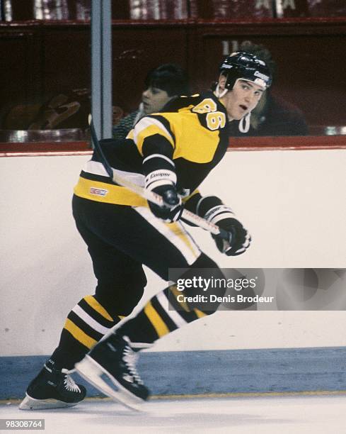 Mario Lemieux of the Pittsburgh Penguins skates against the Montreal Canadiens in the 1990's at the Montreal Forum in Montreal, Quebec, Canada.