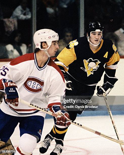 Mario Lemieux of the Pittsburgh Penguins skates against the Montreal Canadiens in the 1990's at the Montreal Forum in Montreal, Quebec, Canada.