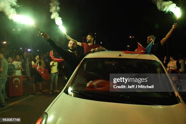 Erdogan's supporters celebrate outside the AK party headquarters on June 24, 2018 in Istanbul, Turkey. Turkey's President Recep Tayyip Erdogan has...