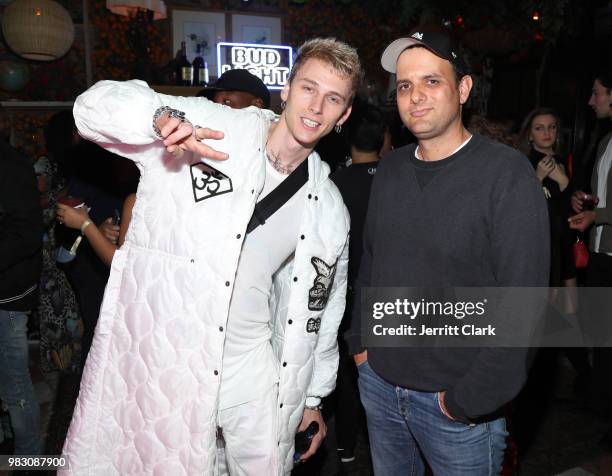 Machine Gun Kelly and John Janick attend IGA X BET Awards Party 2018 on June 23, 2018 in Los Angeles, California.