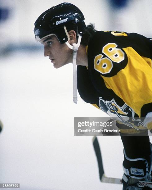 Mario Lemieux of the Pittsburgh Penguins skates against the Montreal Canadiens in the 1990's at the Montreal Forum in Montreal, Quebec, Canada.