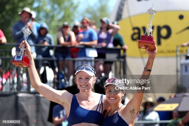 Emily Day and Betsi Flint pose with their trophies after defeating April Ross and Caitlin Ledoux during the Women's Championship game of the AVP...