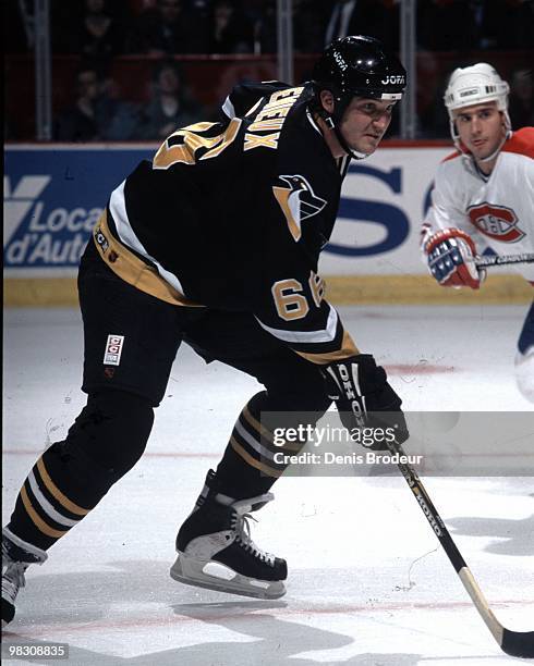 Mario Lemieux of the Pittsburgh Penguins skates against the Montreal Canadiens in the 1990's at the Montreal Forum in Montreal, Quebec, Canada.