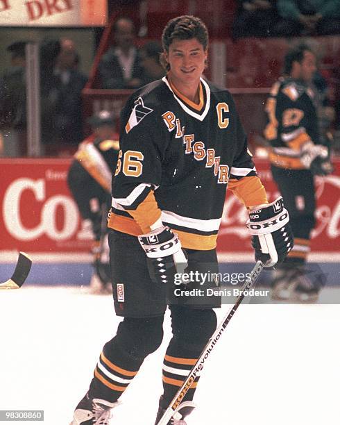 Mario Lemieux of the Pittsburgh Penguins skates against the Montreal Canadiens in the 1990's at the Montreal Forum in Montreal, Quebec, Canada.