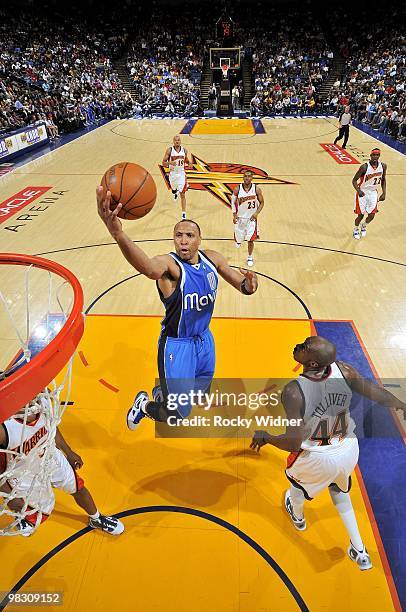 Shawn Marion of the Dallas Mavericks shoots a layup against Anthony Tolliver of the Golden State Warriors during the game at Oracle Arena on March...