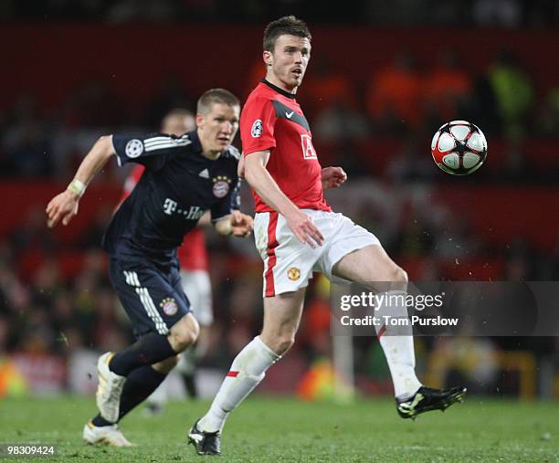 Michael Carrick of Manchester United clashes with Bastian Schweinsteiger of Bayern Munich during the FA Barclays Premier League match between...