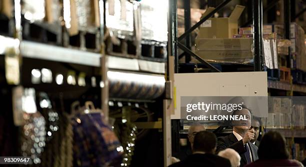 British Conservative Party leader David Cameron speaks to an audience of supporters at a Bestway cash and carry in Cardiff, Wales on April 7, 2010....