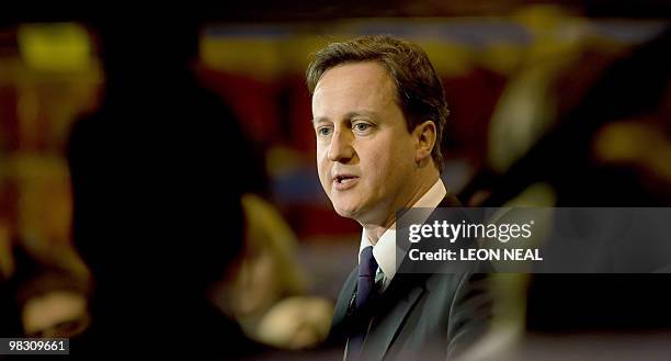 Conservative Party leader David Cameron speaks to an audience of supporters at a Bestway cash and carry in Cardiff, Wales on April 7, 2010. With the...