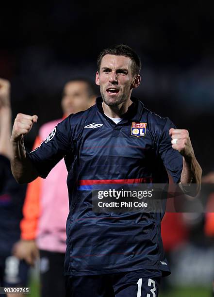 Anthony Reveillere of Olympique Lyonnais celebrates going through to the Semi-Finals after the UEFA Champions League quarter final second leg match...