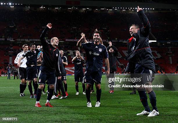 Arjen Robben of Bayern Muenchen celebrates with team mates Hamit Altintop and Ivica Olic at the end of the UEFA Champions League Quarter Final second...