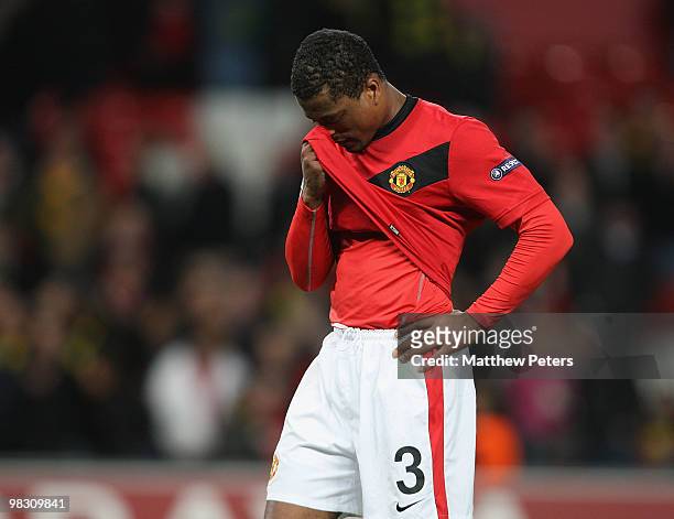 Patrice Evra of Manchester United shows his disappointment after the UEFA Champions League Quarter-Final Second Leg match between Manchester United...