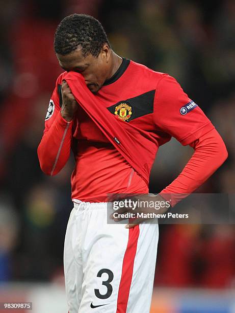 Patrice Evra of Manchester United shows his disappointment after the UEFA Champions League Quarter-Final Second Leg match between Manchester United...