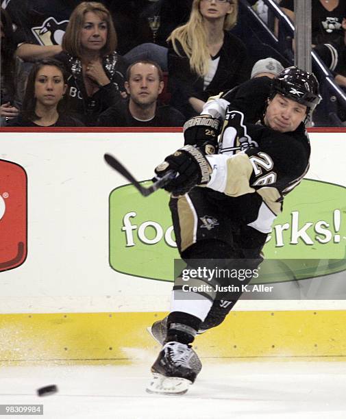 Ruslan Fedotenko of the Pittsburgh Penguins follows through on a shot against the Washington Capitals at Mellon Arena on April 6, 2010 in Pittsburgh,...