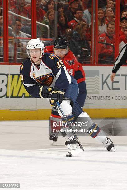 Tobias Enstrom of the Atlant Thrashers skates with the puck during of a NHL hockey game against the Washington Capitals on April 1, 2010 at the...