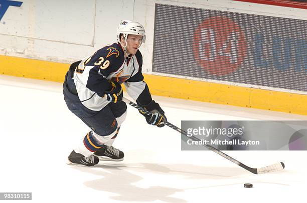 Tobias Enstrom of the Atlant Thrashers skates with the puck of a NHL hockey game against the Washington Capitals on April 1, 2010 at the Verizon...