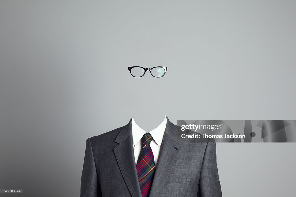 Business man with no face, looking at camera