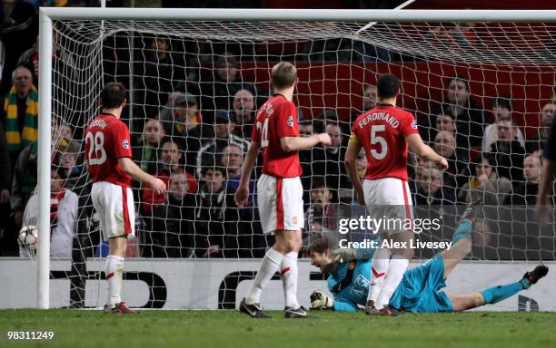 Edwin van der Sar of Manchester United watches the ball hit the back of the net as Arjen Robben of Bayern Muenchen scores his team's second goal...