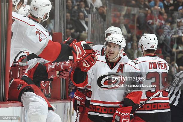 Ray Whitney of the Carolina Hurricanes celebrates a goal with teammates during the NHL game against the Montreal Canadiens on March 31, 2010 at the...