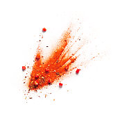 Red chili pepper, powder and flakes burst