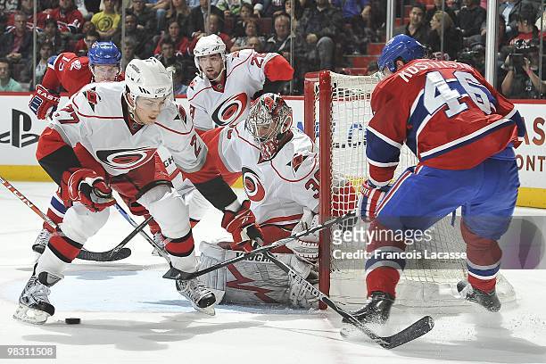 Andrei Kostitsyn of Montreal Canadiens takes a shot on goalie Cam Ward of the Carolina Hurricanes during the NHL game on March 31, 2010 at the Bell...