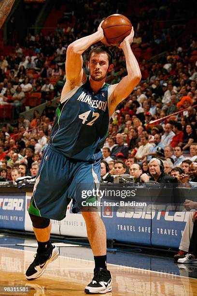 Kevin Love of the Minnesota Timberwolves looks to move the ball against the Miami Heat during the game on February 23, 2010 at American Airlines...