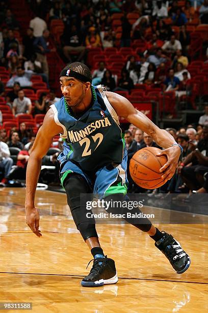 Corey Brewer of the Minnesota Timberwolves moves the ball against the Miami Heat during the game on February 23, 2010 at American Airlines Arena in...