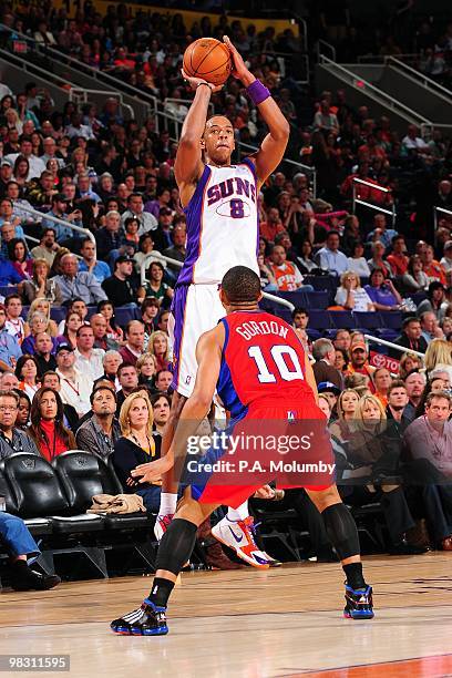 Channing Frye of the Phoenix Suns takes a jump shot against Eric Gordon of the Los Angeles Clippers during the game on February 26, 2010 at U.S....