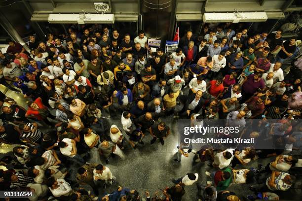 Supporters of Muharrem Ince wait dejectedly at Republican People's Party headquarters on June 24, 2018 in Ankara, Turkey. Turkey's President Recep...