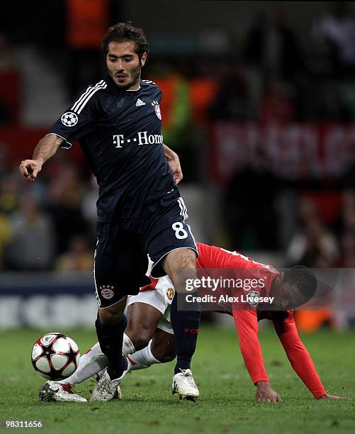 Hamit Altintop of Bayern Muenchen goes past Patrice Evra of Manchester United during the UEFA Champions League Quarter Final second leg match between...