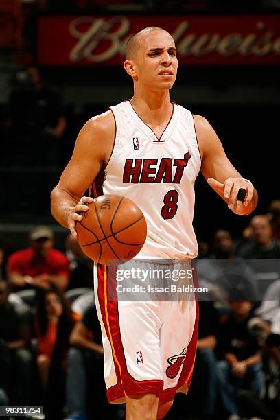 Carlos Arroyo of the Miami Heat moves the ball against the Minnesota Timberwolves during the game on February 23, 2010 at American Airlines Arena in...