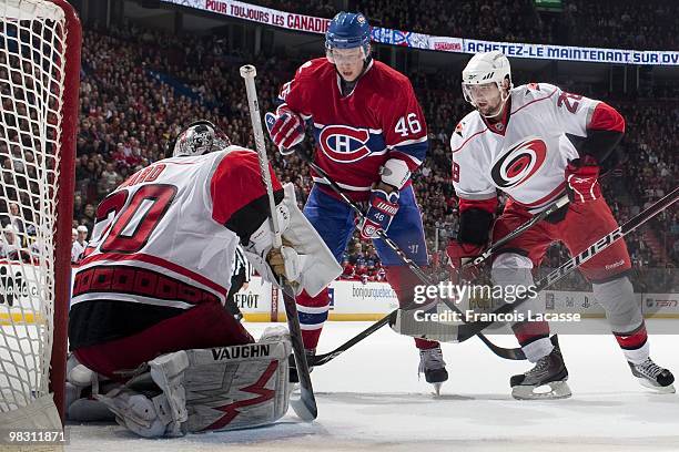 Andrei Kostitsyn of Montreal Canadiens takes a shot on goalie Cam Ward of the Carolina Hurricanes during the NHL game on March 31, 2010 at the Bell...