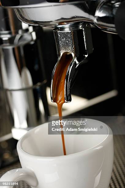 cup of espresso shot with crema - crema stock pictures, royalty-free photos & images
