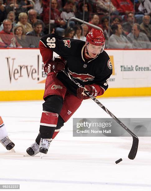 Vernon Fiddler of the Phoenix Coyotes settles a bouncing puck down while skating up ice against the Edmonton Oilers on April 3, 2010 at Jobing.com...