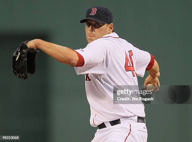 John Lackey of the Boston Red Sox throws against the New York Yankees at Fenway Park on April 7, 2010 in Boston, Massachusetts.