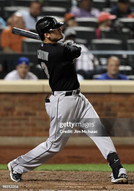 Jorge Cantu of the Florida Marlins follows through on his third inning home run against the New York Mets on April 7, 2010 at Citi Field in the...