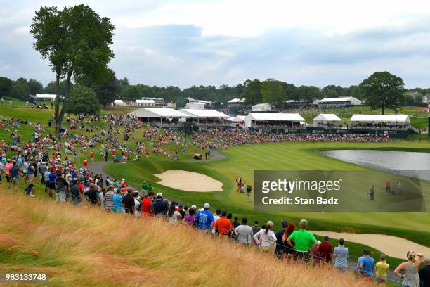 Bubba Watson plays a shot from the 17th fairway during the final round of the Travelers Championship at TPC River Highlands on June 24, 2018 in...