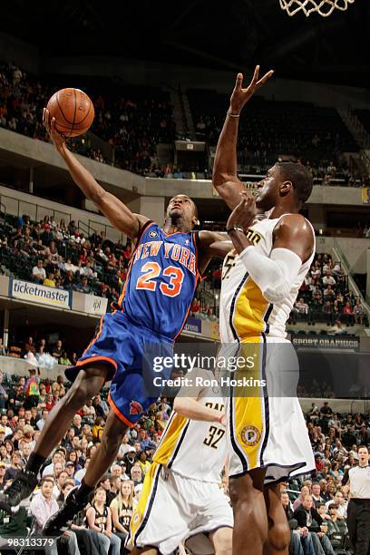 Toney Douglas of the New York Knicks shoots over Roy Hibbert of the Indiana Pacers at Conseco Fieldhouse on April 7, 2010 in Indianapolis, Indiana....