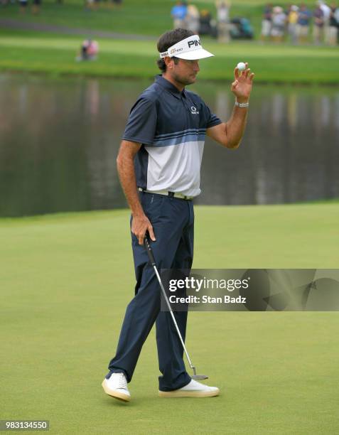 Bubba Watson acknowledges the gallery on the 16th hole during the final round of the Travelers Championship at TPC River Highlands on June 24, 2018...