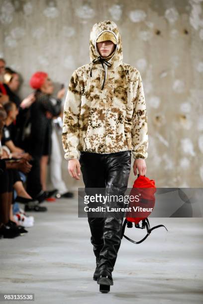 Model walks the runway during the 1017 ALYX 9SM Menswear Spring/Summer 2019 show as part of Paris Fashion Week on June 24, 2018 in Paris, France.